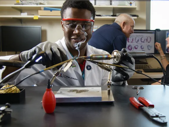 African-American med student in lab.