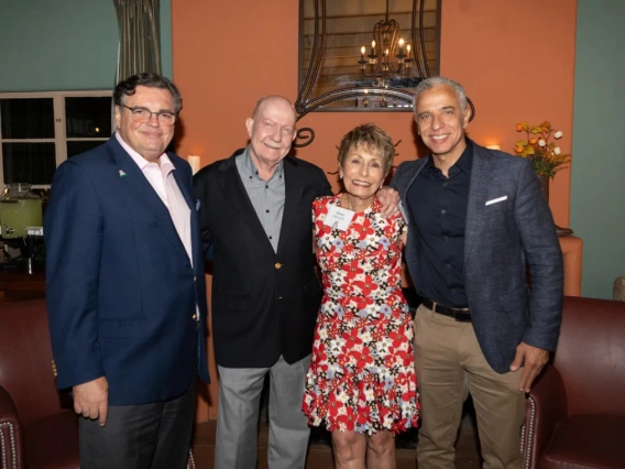 From left: Michael Abecassis, dean of the U of A College of Medicine – Tucson, with Tom Rogers, Ginny L. Clements and Hesham Sadek.