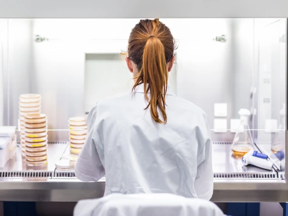 lab worker at hood