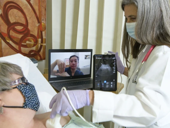 Rural health care provider receiving ultrasound guidance via a telehealth consultation