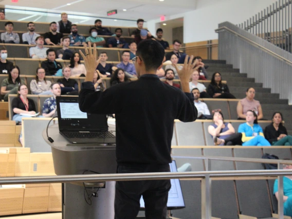 [PGY-3 Mateo Mendoza, MD, gesticulates during his award-winning oral presentation on “Assessing the Utility of Provocative Maneuvers During Right Heart Catheterization in Pulmonary Venous Hypertension.” ]
