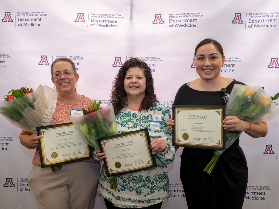 [Three of four winners of honors at the U of A Department of Medicine’s Administrative Professional Day awards breakfast, April 23, Cardiology’s Dawn Henderson, and Nephrology’s Gina Favela and Nephrology's Bersabe Lopez, who also is an administrative lead for the Vice Chair of Education Office. Hematology & Oncology’s James Deljanovan, the fourth winner, couldn’t attend.]
