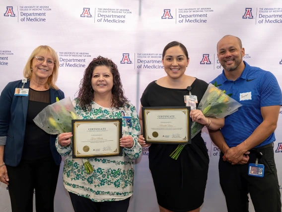 [The Division of Nephrology’s Sandy Seifert, award winner Gina Favela, award winner Bersabe Lopez, and clinical associate director Scott Hall.]