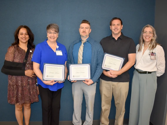 [Awardees and presenters for honors by the Division of General Internal Medicine, Geriatrics & Palliative Medicine (left to right): presenter Indu Partha, MD;  awardees Lorraine Yentzer, AG-ACNP-BC, Jason Toone and Dani Farhat, DO; and presenter Amy Klein, MD]