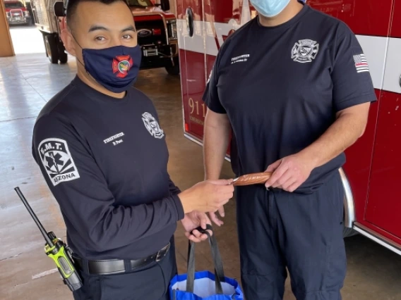 NFD Firefighter EMT Pablo Paez and Firefighter Paramedic German Arana