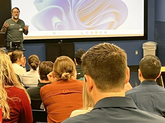 [At orientation day in Lecture Hall 5403 on June 16, Josh Malo, MD, a lung transplant specialist and IM Residency – Tucson associate program director, offers tips to new interns – or first-years – in the program regarding things to keep in mind while on service in clinical settings.]