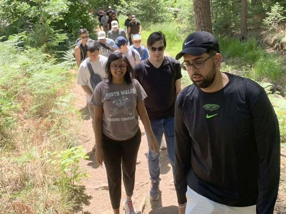 [IM Chief Resident Josh Sethi, MD, MS, leads the pack on their 3.6 mile Mount Lemmon hike, June 22. About 45 minutes from the U of A campus, Mount Lemmon is 9,159 feet above sea level – the second highest point in the mountain ranges surrounding Tucson. The highest is Mount Wrightson in the Santa Rita Mountains south of Tucson at 9,453 feet.]