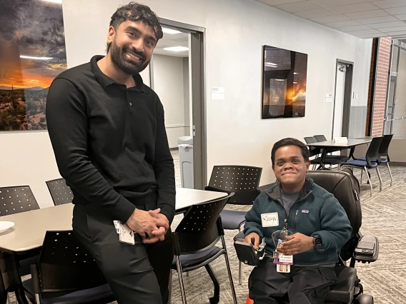 [New interns in the IM Residency – Tucson program Mujtaba Shah, DO, and Khaja Siddiqui, MD, enjoy a chat June 30 during the Internal Medicine Research Mixer in the COM-T Social Hall.]