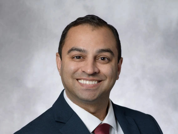 Image of Dr. Deonarain in a suit