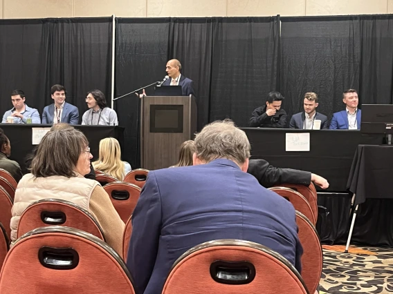 [The Doctor’s Dilemma competition pitting (on the left) the U of A College of Medicine – Tucson medical students Curtis Josephs, Jacob Ref and David Mintz (MS4s) and the U of A Internal Medicine resident team, Nelson Pham, MD, Nate Walton, MD, and Will Waidelich, MD.]