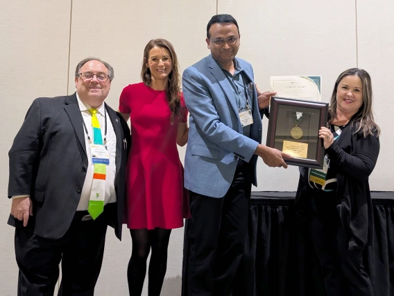 [2025 Laureate of the Year award winner Bijin Thajudeen, MD, FACP, MACP, FASN (2nd from right), DOM vice chair for community engagement and partnerships, and Division of Nephrology inpatient nephrology and dialysis unit services medical director and clinical research and outcomes associate director, with (from left) ACP Arizona Chapter governor Allan Markus, MD, MS, MBA, FACP, 2025 ACP-AZ Scientific Meeting chair Krystal Renszel, DO FACP; and the DOM’s Joy Bulger-Beck, MD, ACP-AZ Awards Committee chair.]