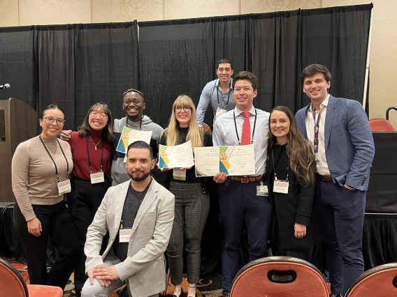 [From left, top row: U of A College of Medicine – Tucson participating students, Iliana Cosio, Laura Tran, Toluwalase Talabi, Hannah Rosch Newton, Joseph Gunderson, Alisia Tumac, and Jacob Ref; front row, kneeling: Ben Litmanovich.]