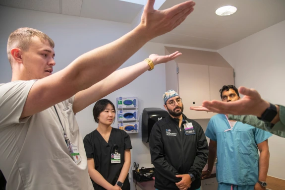 Dr. Pilitsis mentoring medical students and neurosurgery residents