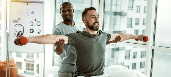 Sports medicine physician with patient