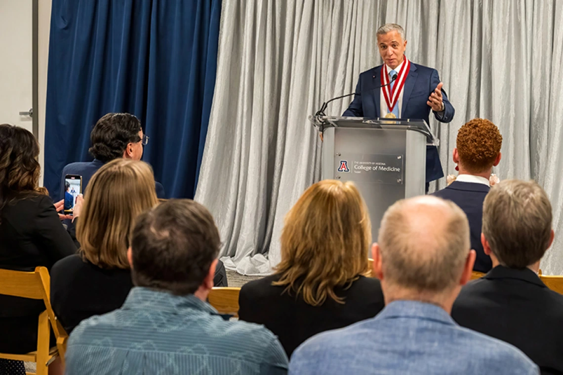 Hesham Sadek, MD, PhD, Cardiology division chief and Sarver Heart Center director, makes a point during comments at his investiture ceremony.
