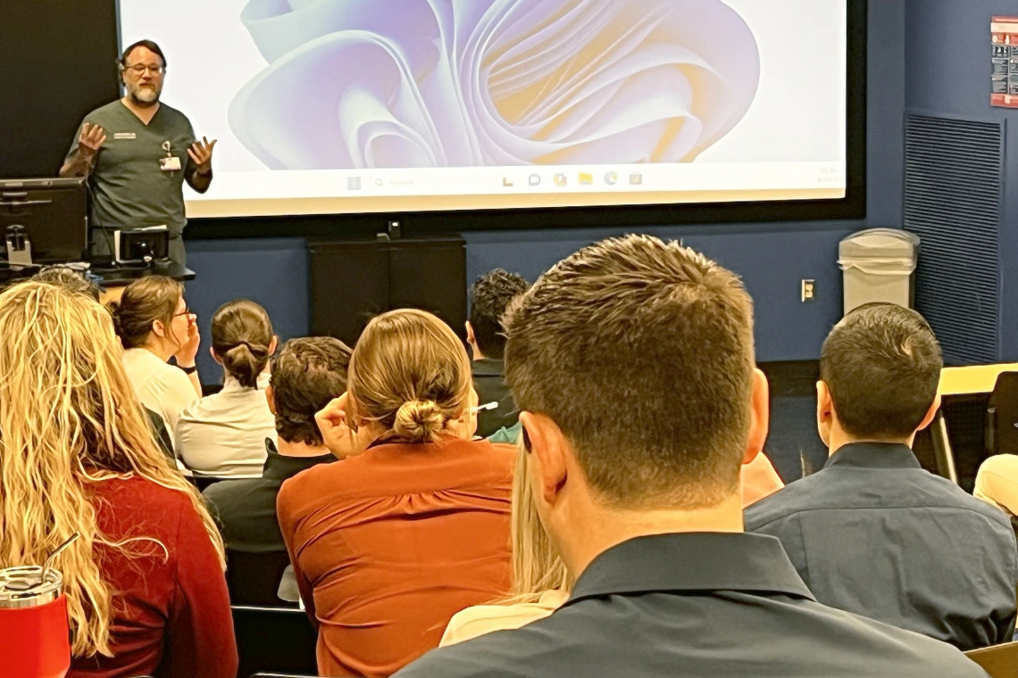 [At orientation day in Lecture Hall 5403 on June 16, Josh Malo, MD, a lung transplant specialist and IM Residency – Tucson associate program director, offers tips to new interns – or first-years – in the program regarding things to keep in mind while on service in clinical settings.]