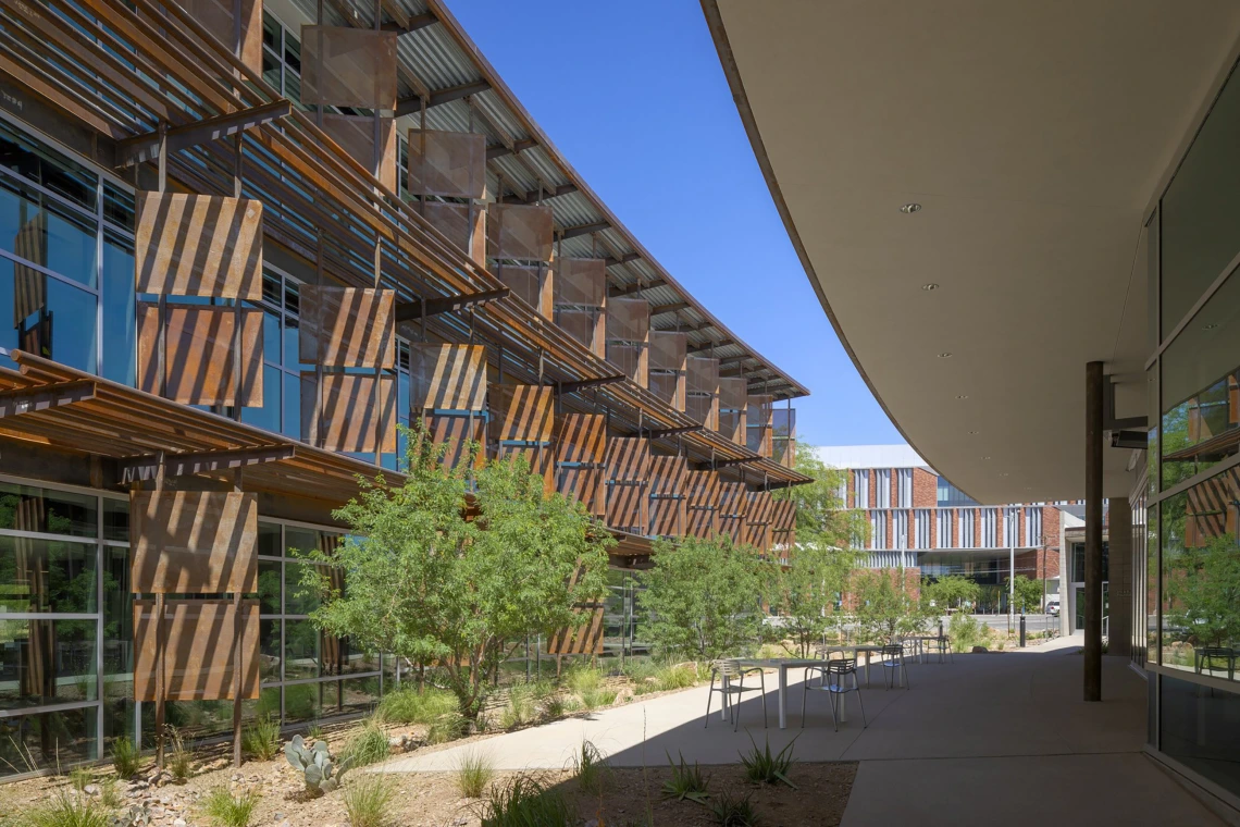 [Host for the WellDOM Chess Club meetup on July 7, the Iris Cantor Building sits behind the main building of the Andrew Weil Center for Integrative Medicine at the intersection of Mabel Street and Vine Avenue just west of the UAHS Health Sciences Innovation Building.]