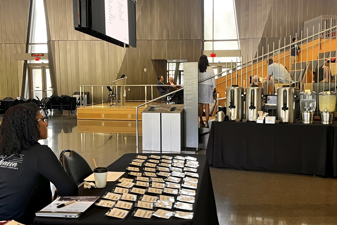 [The registration table as the 2025 Clinical Trials Development Workshop gets under way in the HSIB Forum.]