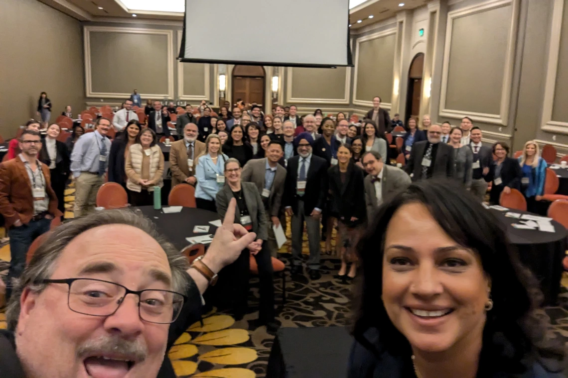 [Selfie with ACP-AZ Chapter Governor Allan Markus, MD, and 2024 Scientific Meeting chair, Indu Partha, MD, after one of the talks.]