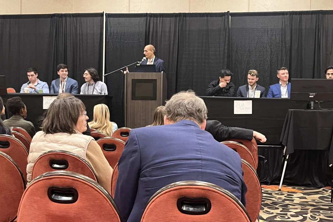 [The Doctor’s Dilemma competition pitting (on the left) the U of A College of Medicine – Tucson medical students Curtis Josephs, Jacob Ref and David Mintz (MS4s) and the U of A Internal Medicine resident team, Nelson Pham, MD, Nate Walton, MD, and Will Waidelich, MD.]