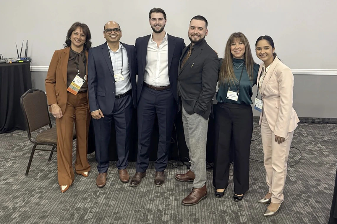[Last year’s ACP-AZ Chapter Scientific Committee meeting chair and the ACP-AZ Fall Board of Governors Task Force chair Indu Partha, MD (left), with next year’s meeting chair Bujji Ainapurapu, MD, Joey Ghotmi (MS4), Ben Litmanovich (MS4), 2025 ACP-AZ Chapter Educator of the Year Amy Sussman, MD, and Nandini Sodhi (MS4).]