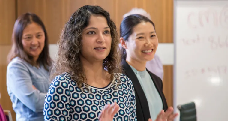 Salma Patel, MD, MPH (center), and Lora Wang, MD (right)