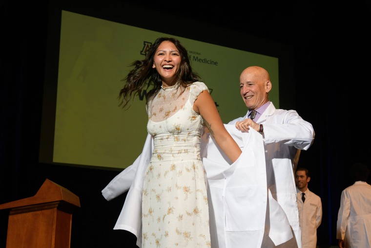 Medical student receives a white coat