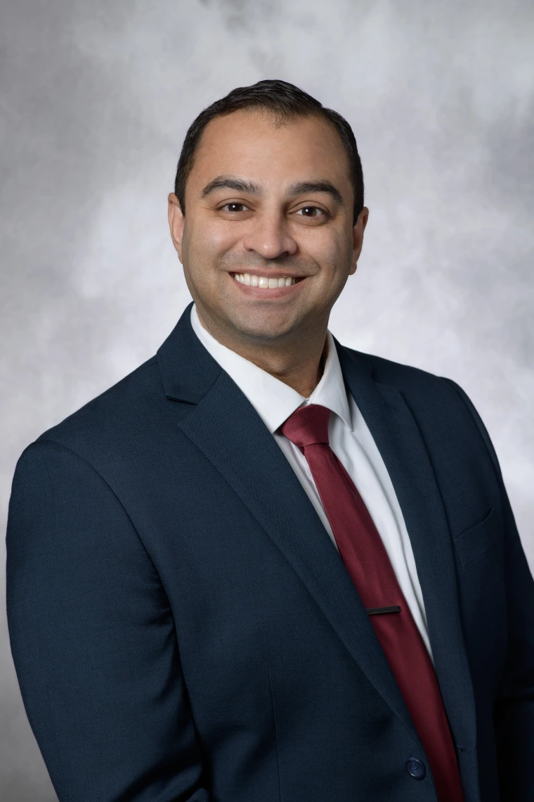 Image of Dr. Deonarain in a suit