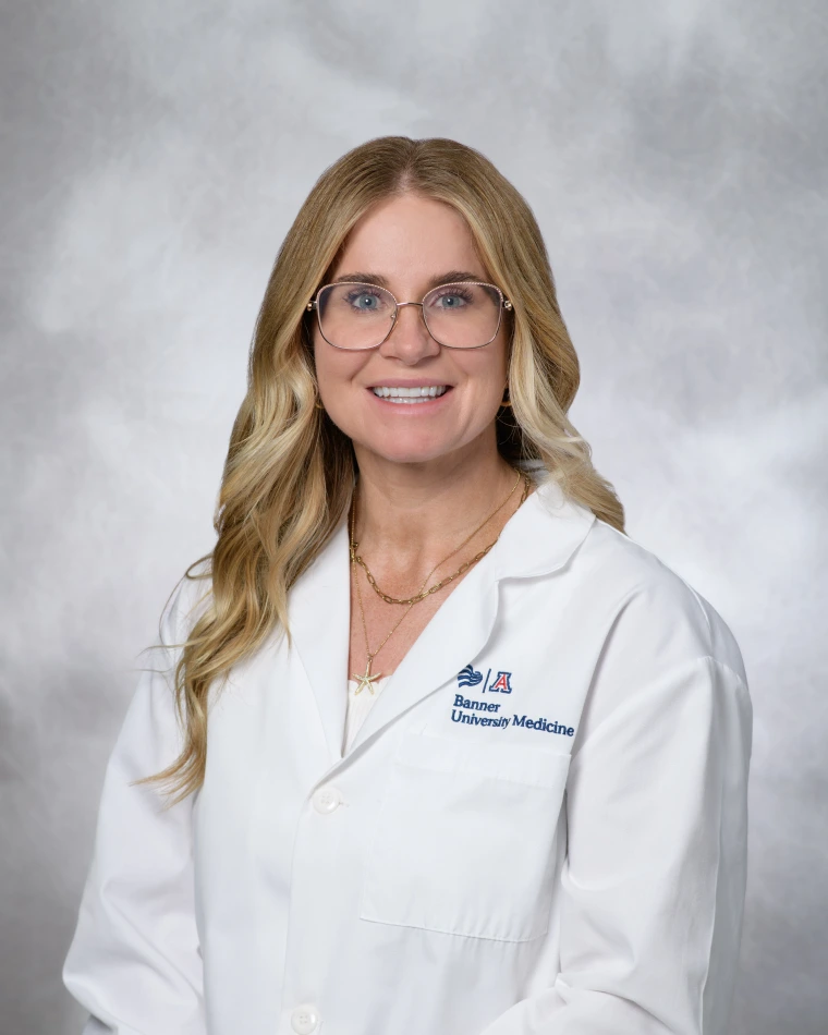 Kyleigh Staples in a white coat