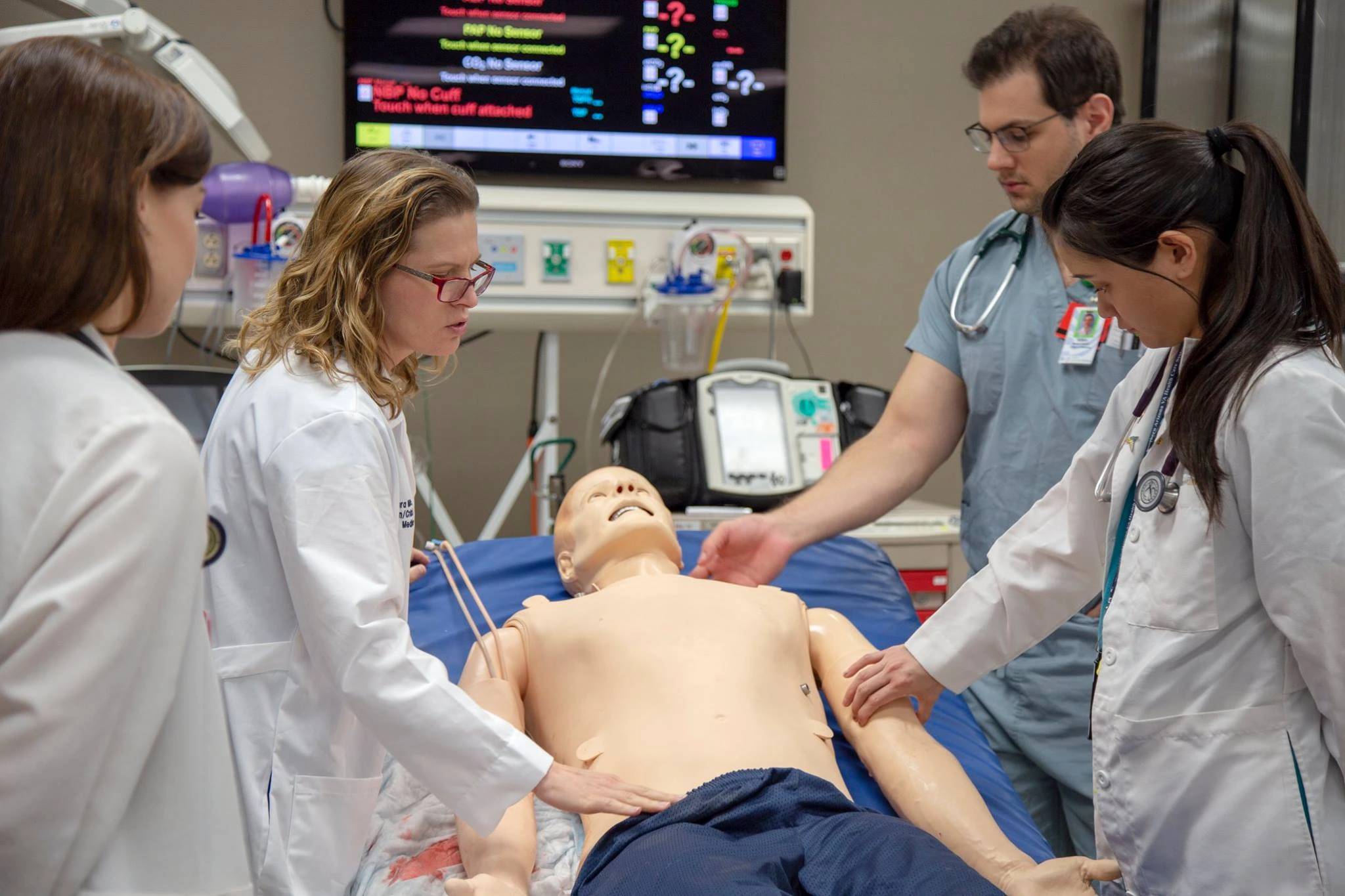 Laura E. Meinke, MD, in ASTEC lab with trainees