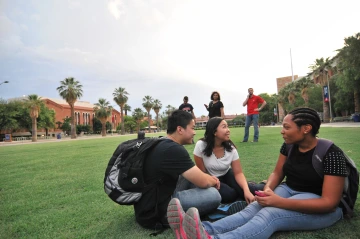 students on campus lawn