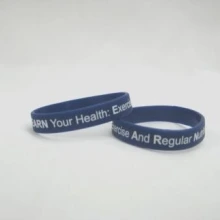 Blue Wrist Band - with words - Exercise and Regular Nutrition