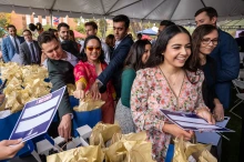 Fourth-year medical students collect gift bags before learning where they will spend the next several years in residency training programs.