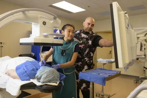 Annie Lee, MD, performed fluoroscopic-guided interventional pain management procedures under the watchful eye of Mohab Ibrahim, MD, PhD, as part of the Pain Fellowship program.